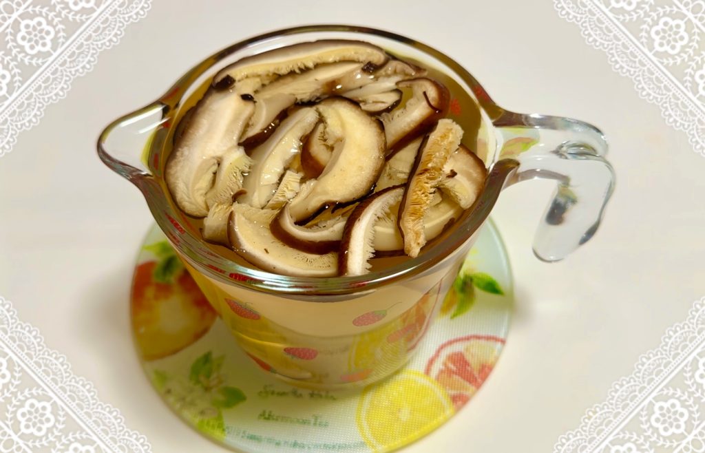 Combine dried shiitake mushrooms and dashi stock.