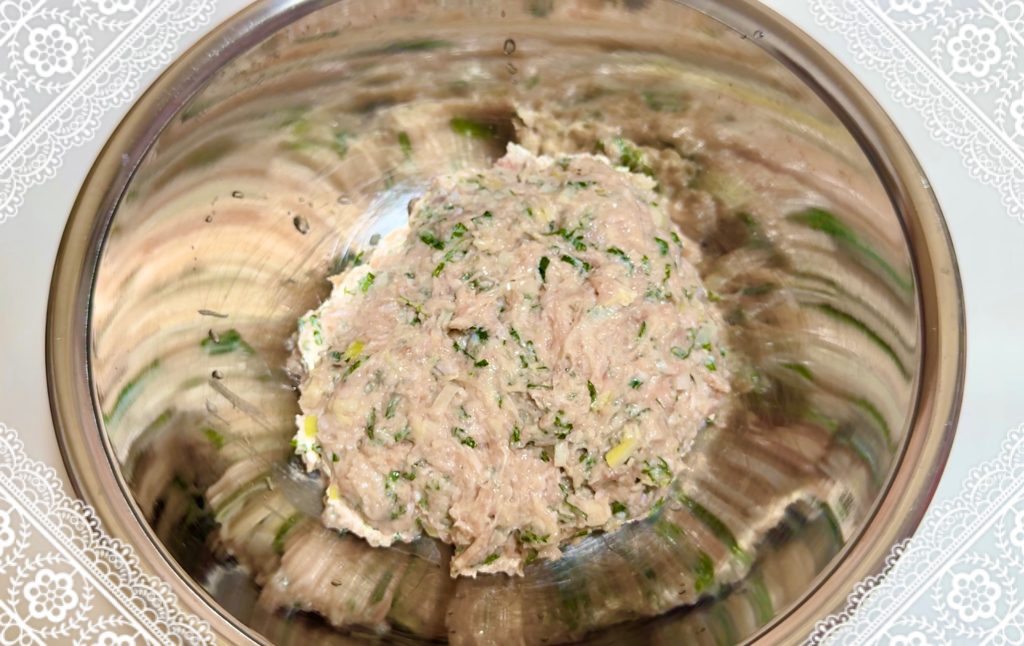 Mix the chicken meatball ingredients well until sticky.