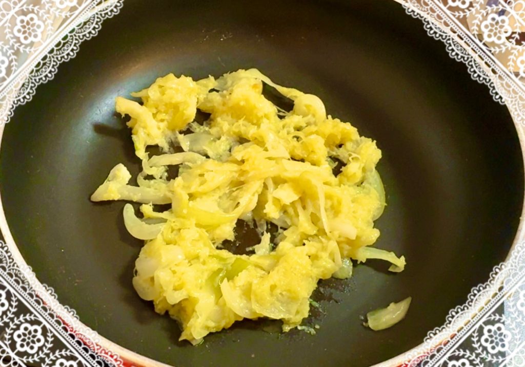 Shkmeruli, Sauté onions and garlic in butter.