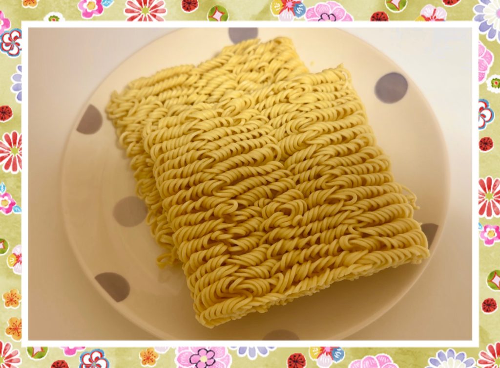 Braised noodles added to a spicy hotpot